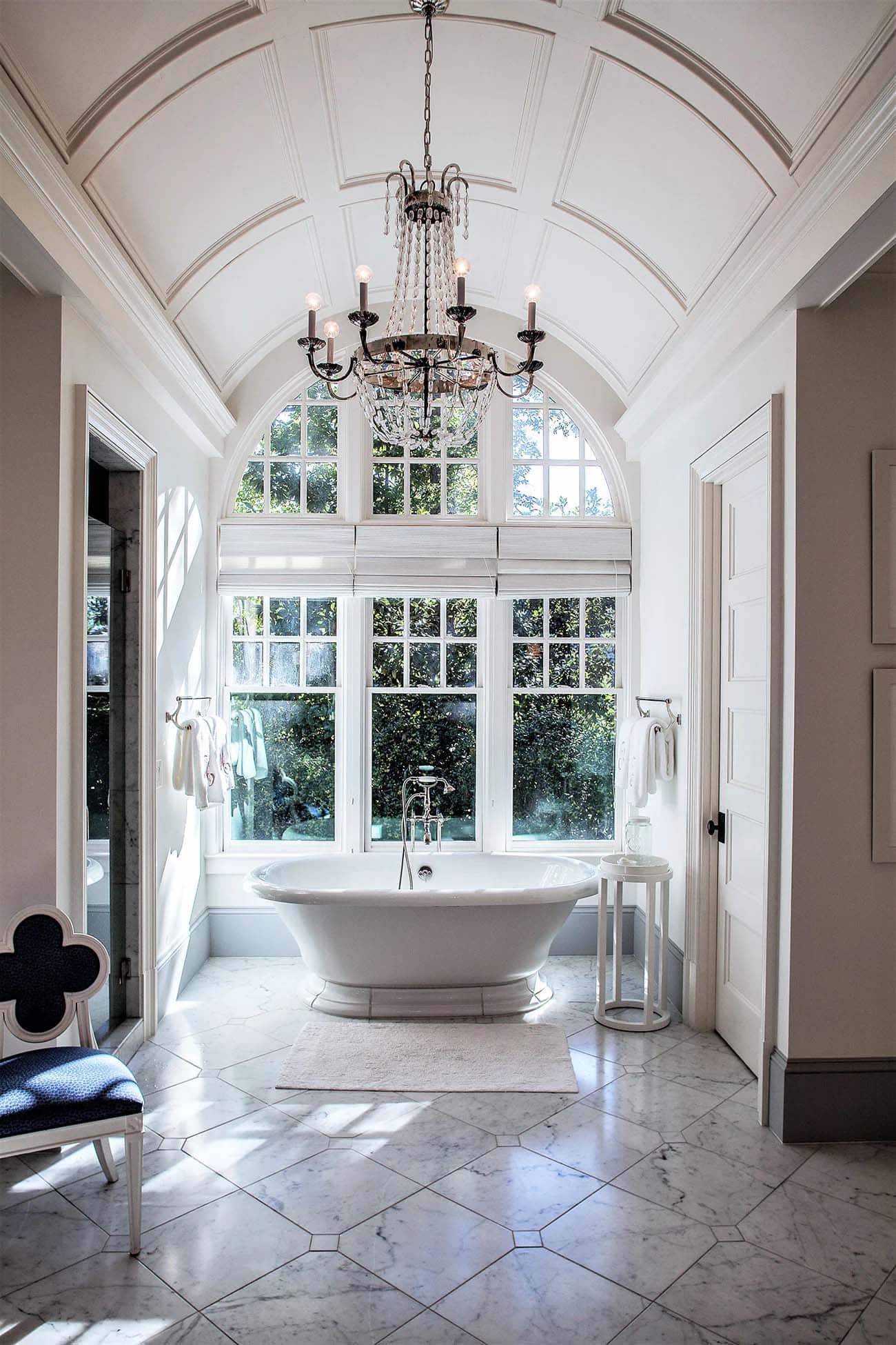 traditonal style bathroom with a freestanding tub