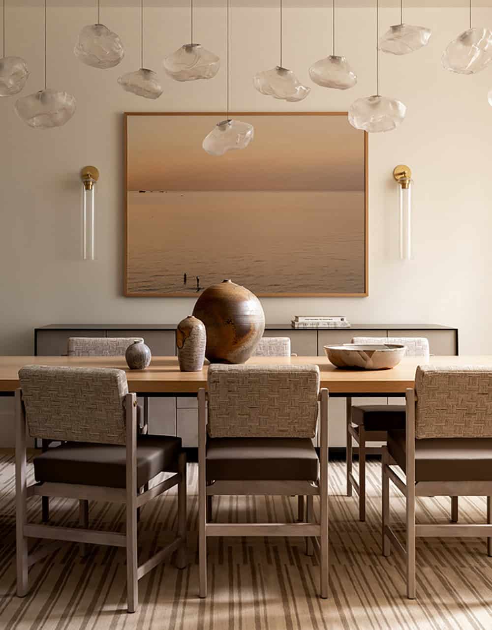 contemporary formal dining room with a large painting