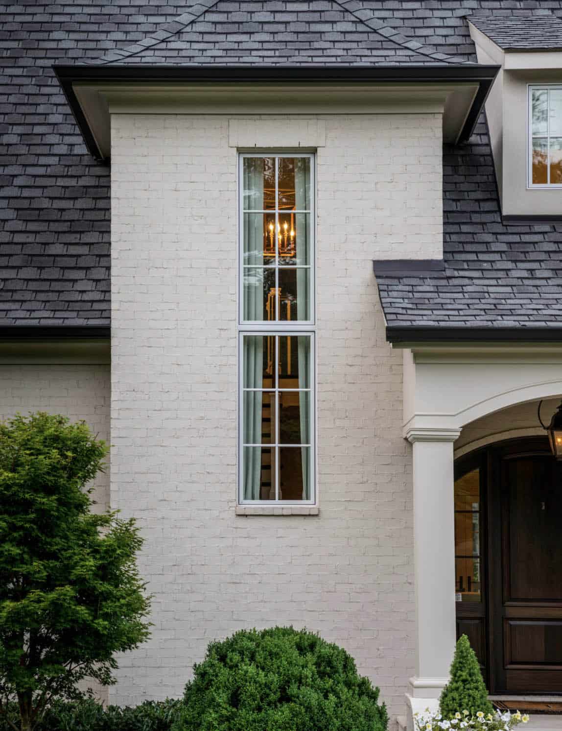 French Country home exterior close-up of roofline and window detailing, Belle Meade Nashville Tennessee