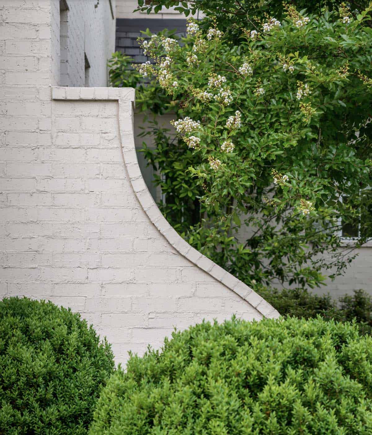 French Country home exterior side elevation with traditional architectural detailing, Nashville Tennessee