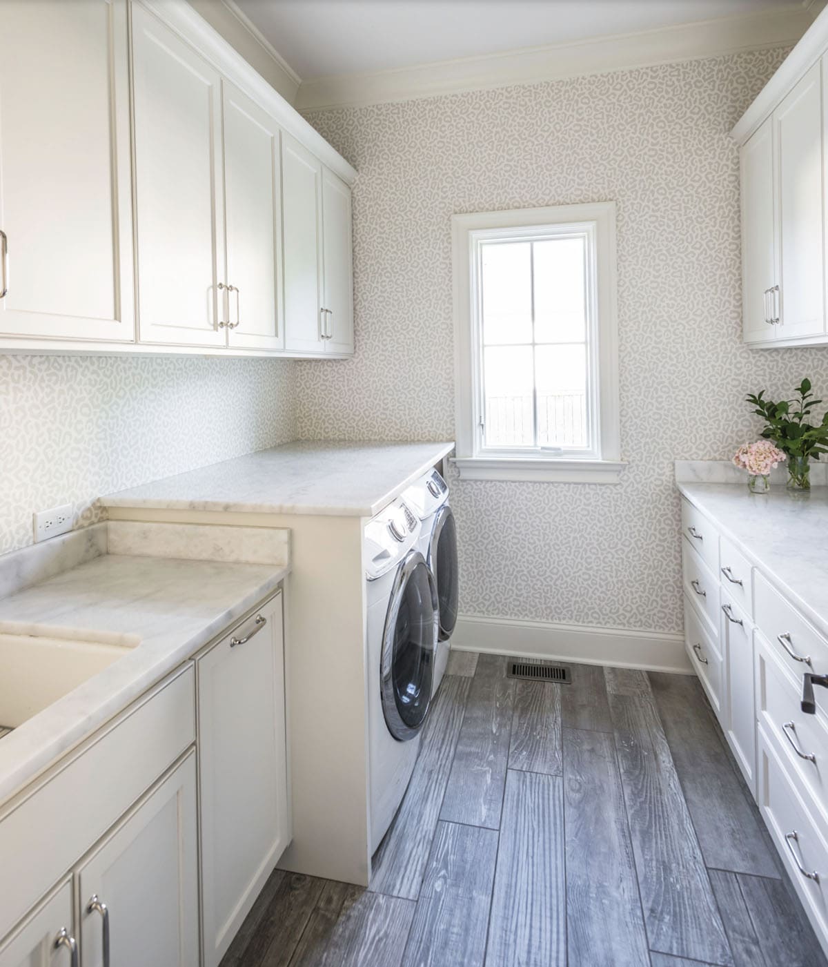 Traditional French Country laundry room with window, custom cabinetry, and natural light, Nashville Tennessee