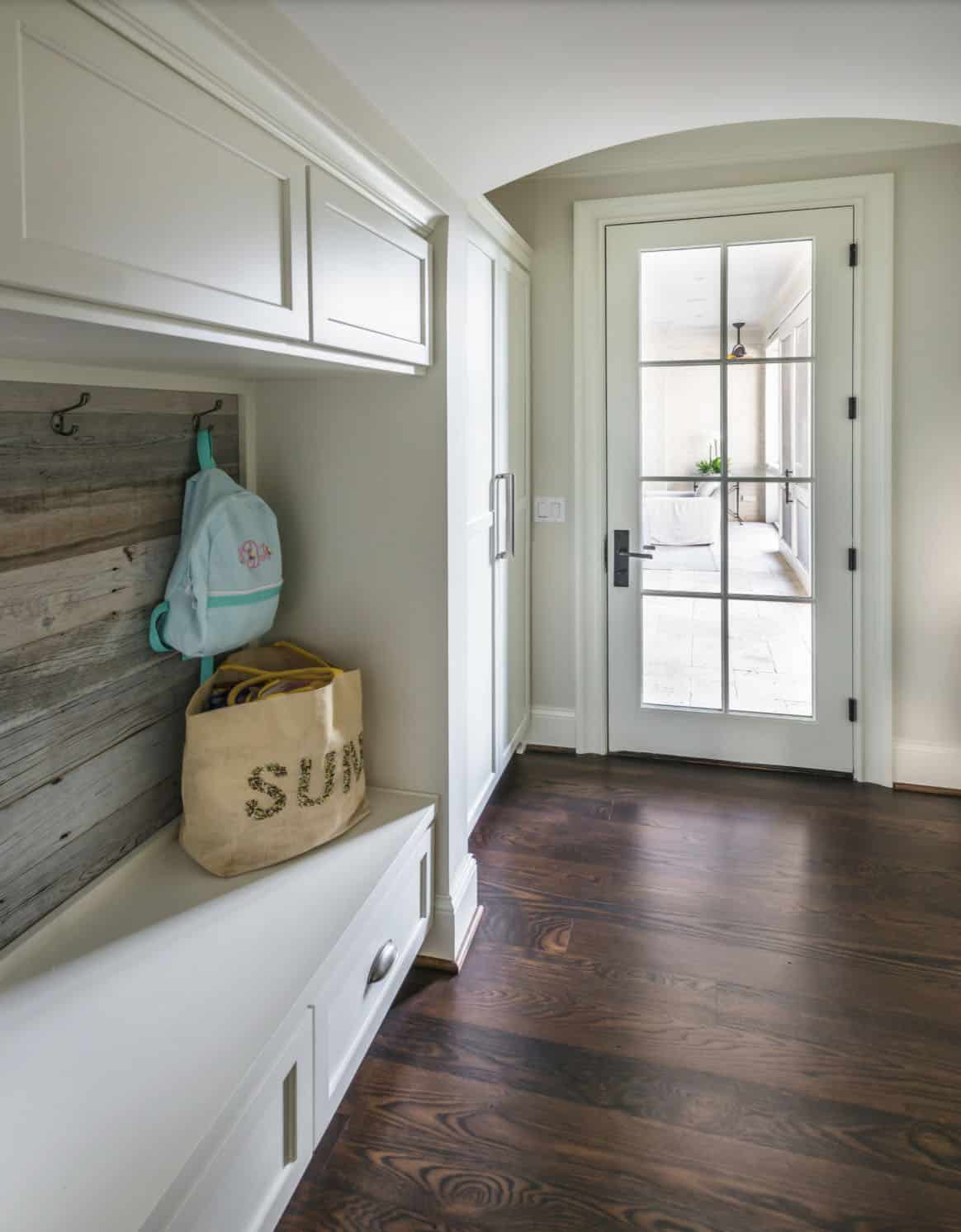 Traditional French Country mudroom entry with built-in bench, cubbies, and hardwood floors, Belle Meade Nashville