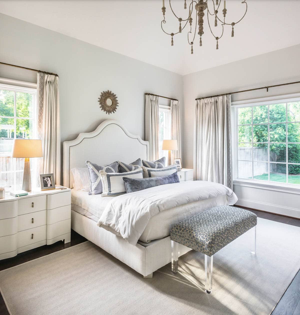 Traditional French Country primary bedroom with large windows and elegant furnishings, Nashville Tennessee