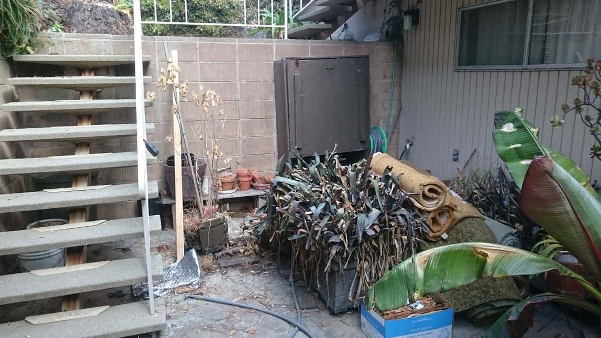 before renovation of midcentury modern outdoor patio and staircase