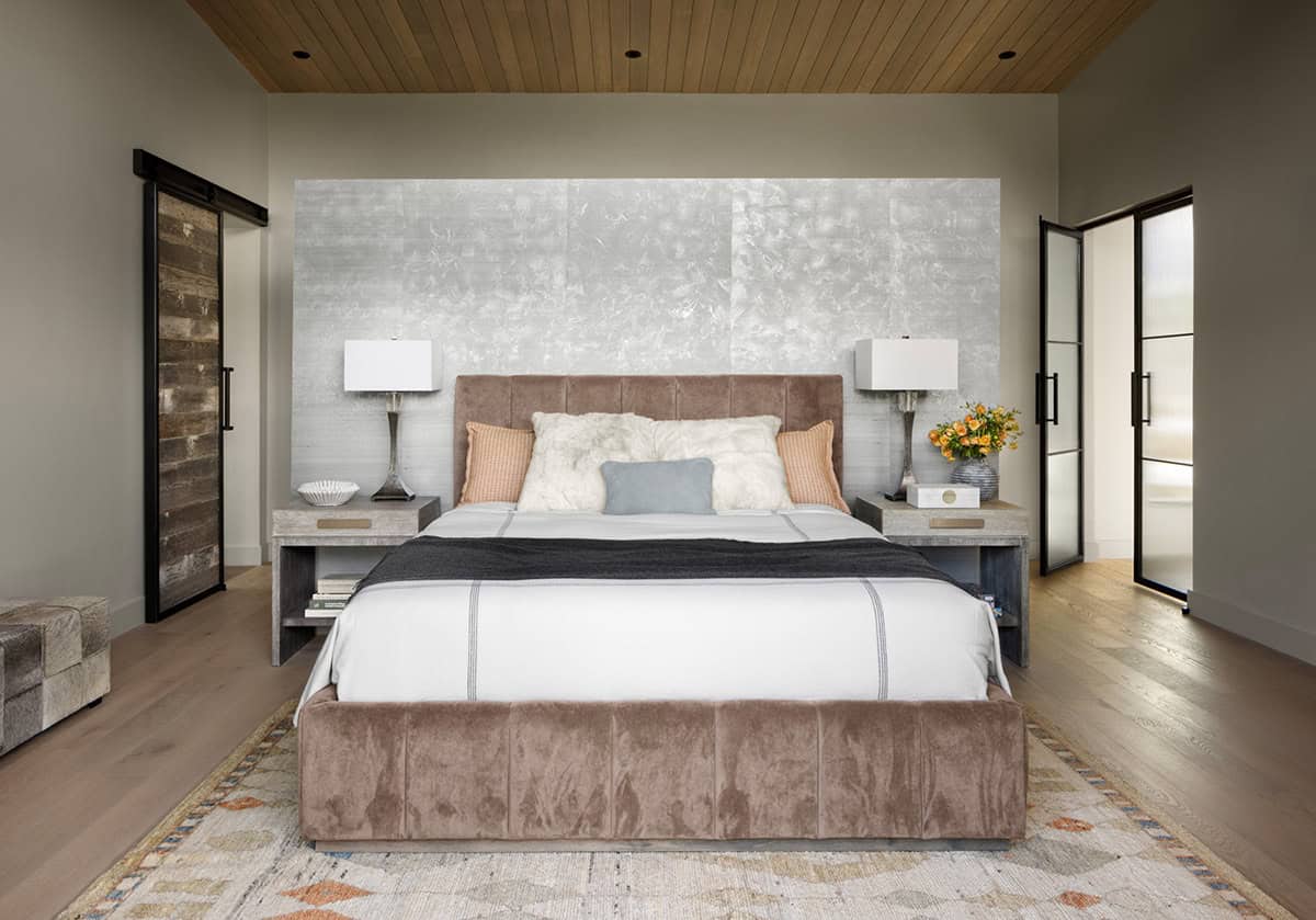 contemporary bedroom with wallpaper statement wall
