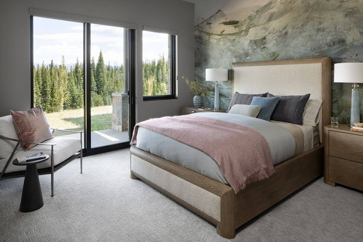 contemporary guest bedroom with sliding glass doors leading to the back patio