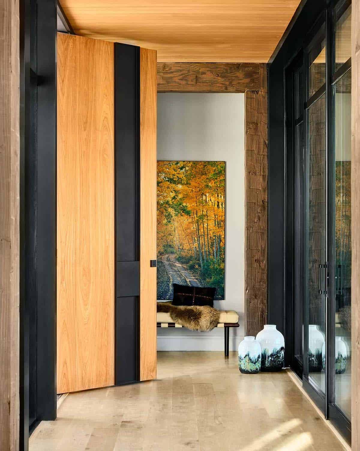 custom front entry door open with views to mountain landscape Vertical Arts architecture