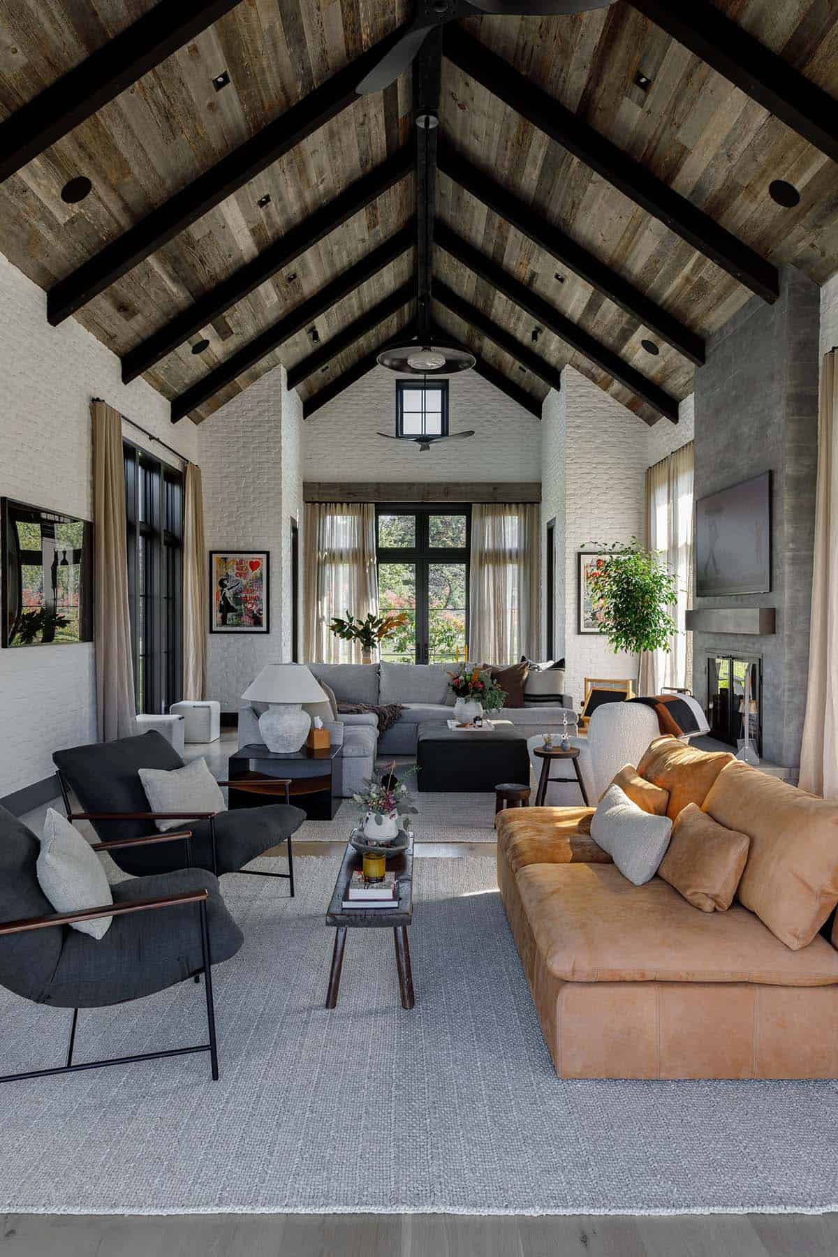 rustic modern living room with a vaulted ceiling