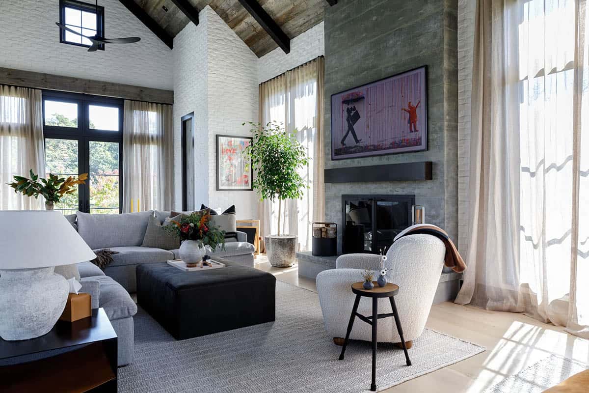 rustic modern living room with a fireplace and artwork