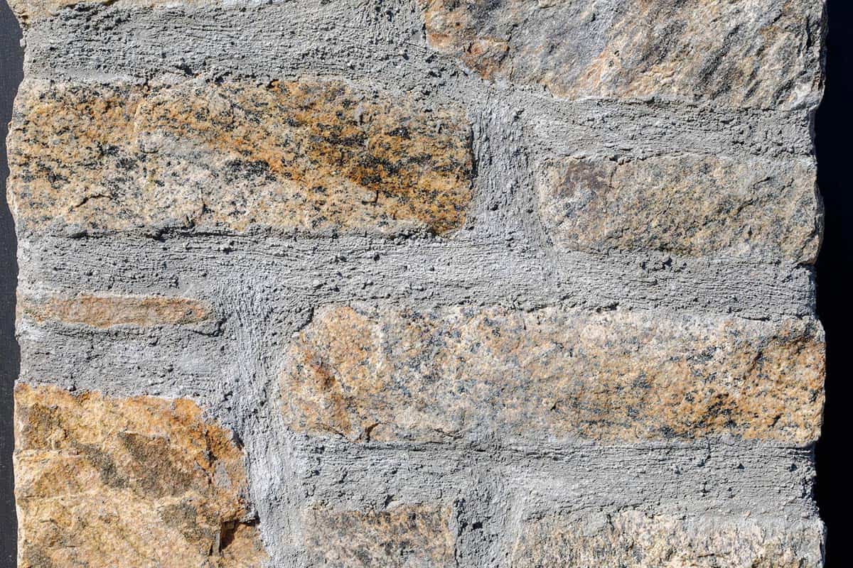 rustic modern barn house exterior stone wall detail