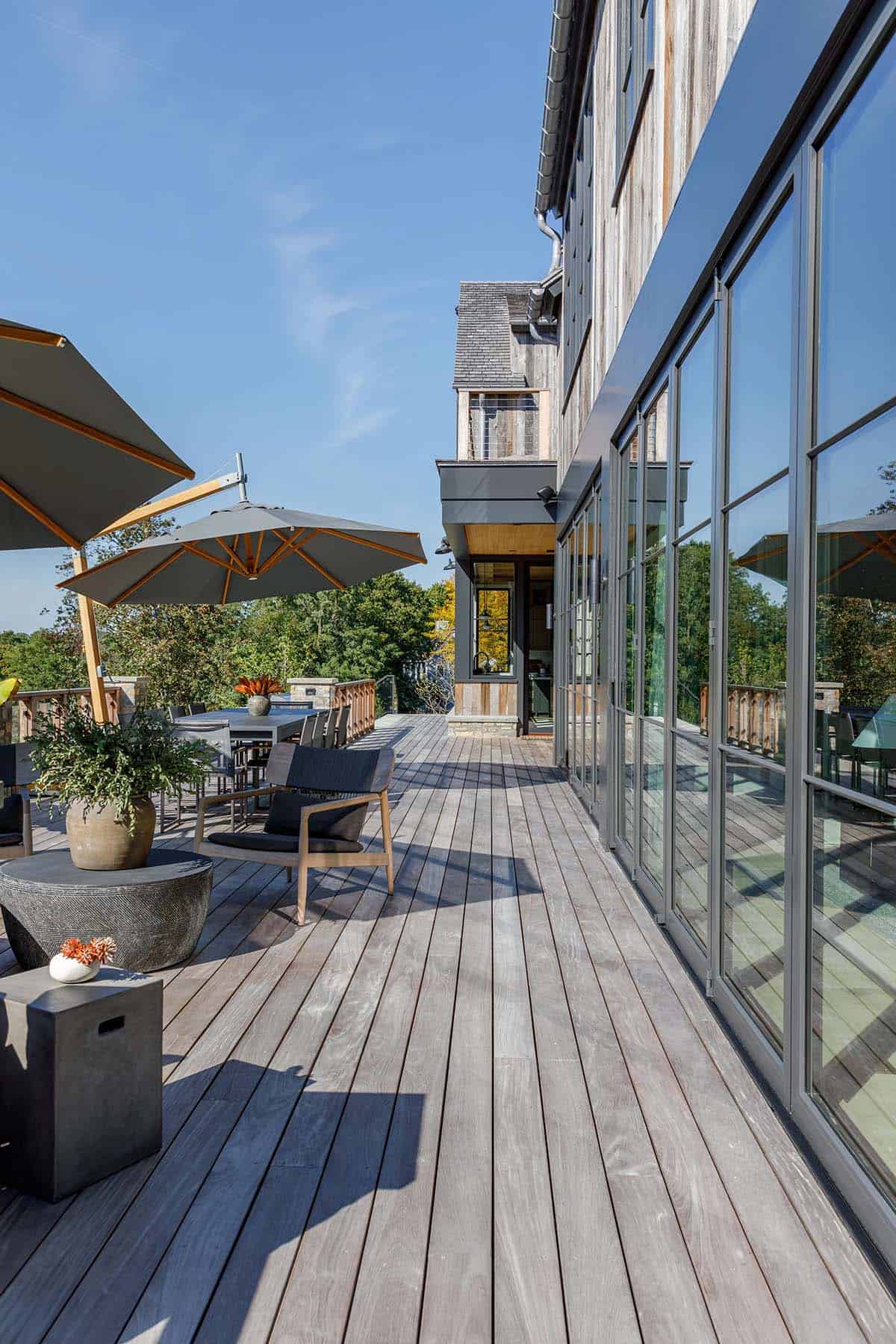 rustic modern barn house exterior with a deck