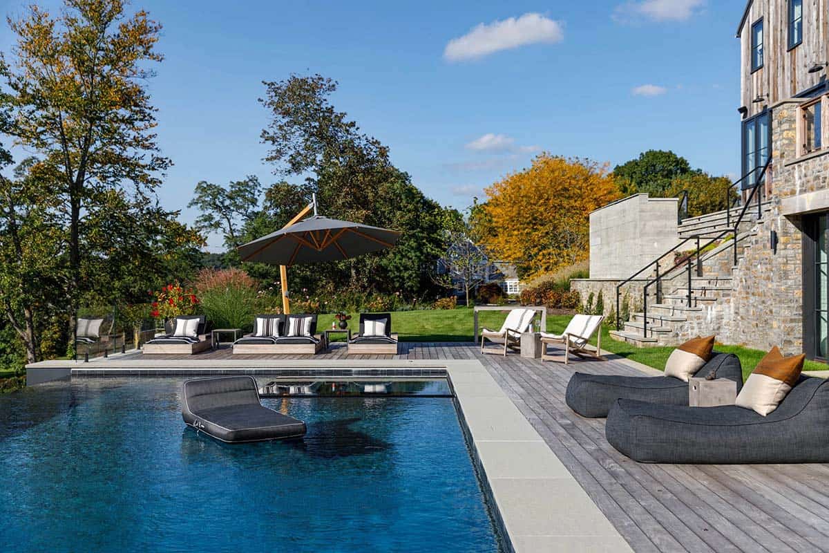 rustic modern barn house exterior backyard with a pool