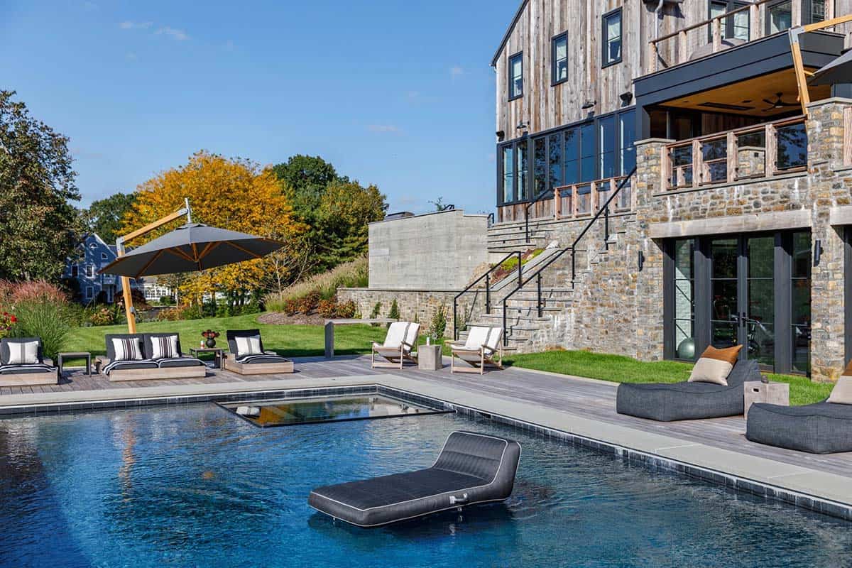 rustic modern barn house exterior backyard with a pool