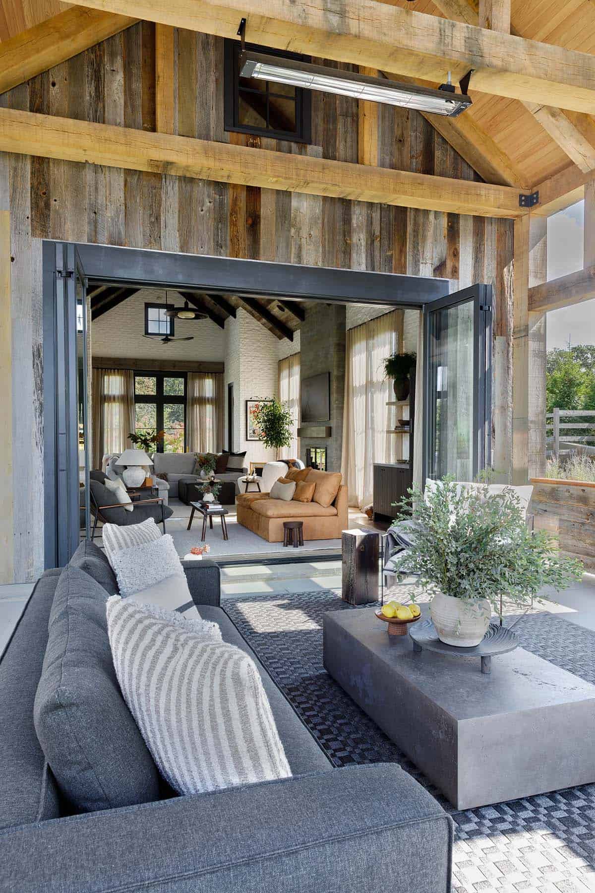 rustic modern covered porch with outdoor furniture