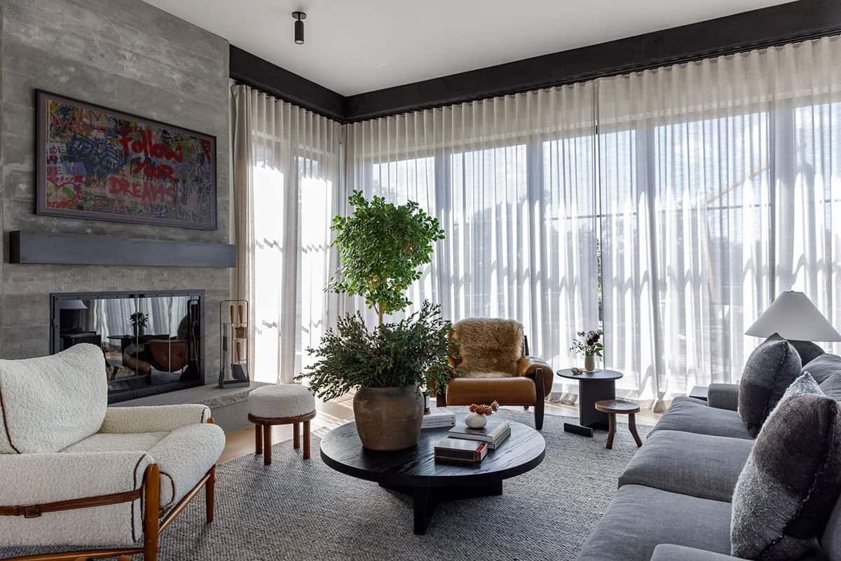 rustic modern family room with large windows