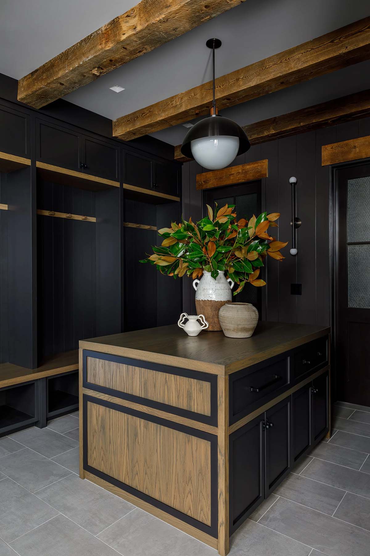 rustic modern mudroom with an island