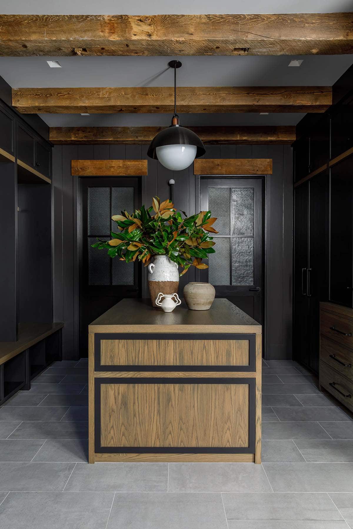 rustic modern mudroom with an island