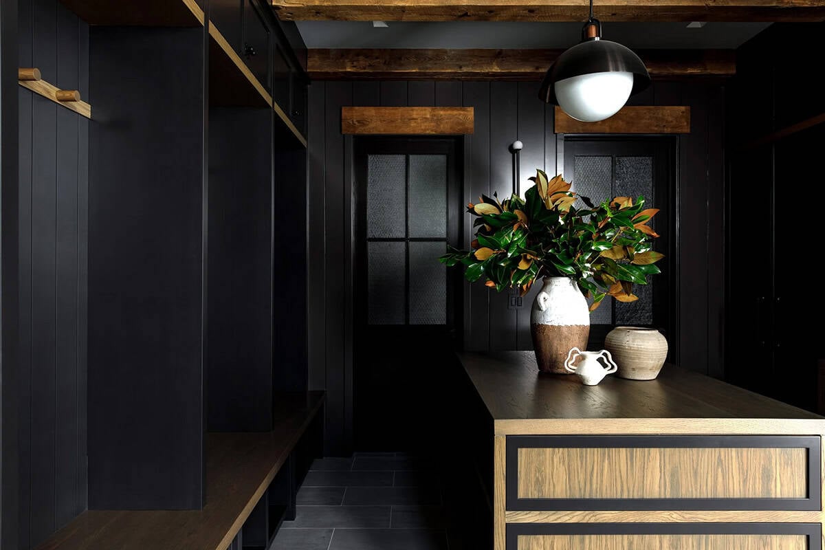 rustic modern mudroom with an island 