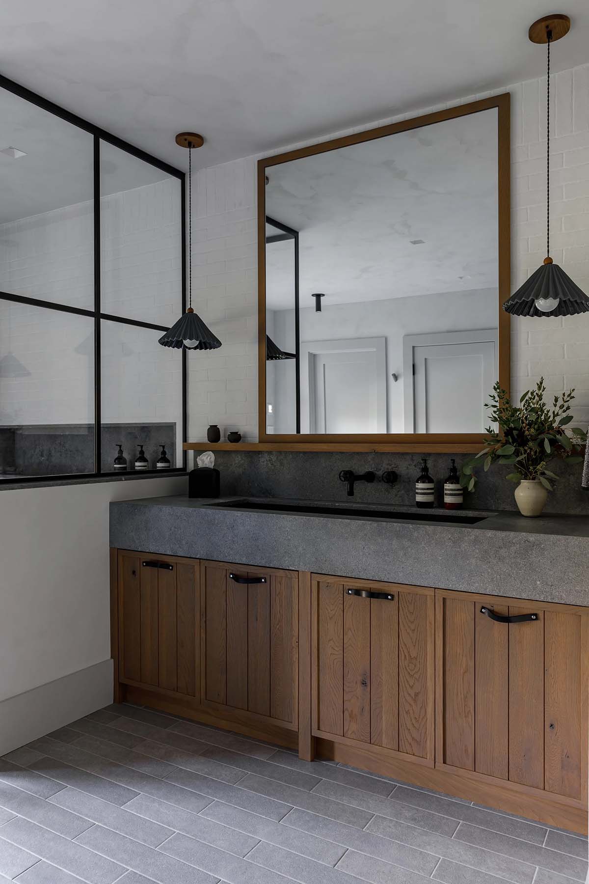 rustic modern bathroom vanity and hanging pendant lights
