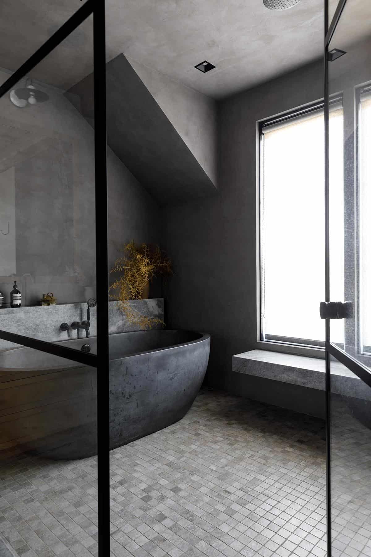 rustic modern bathroom with a wet room and freestanding tub