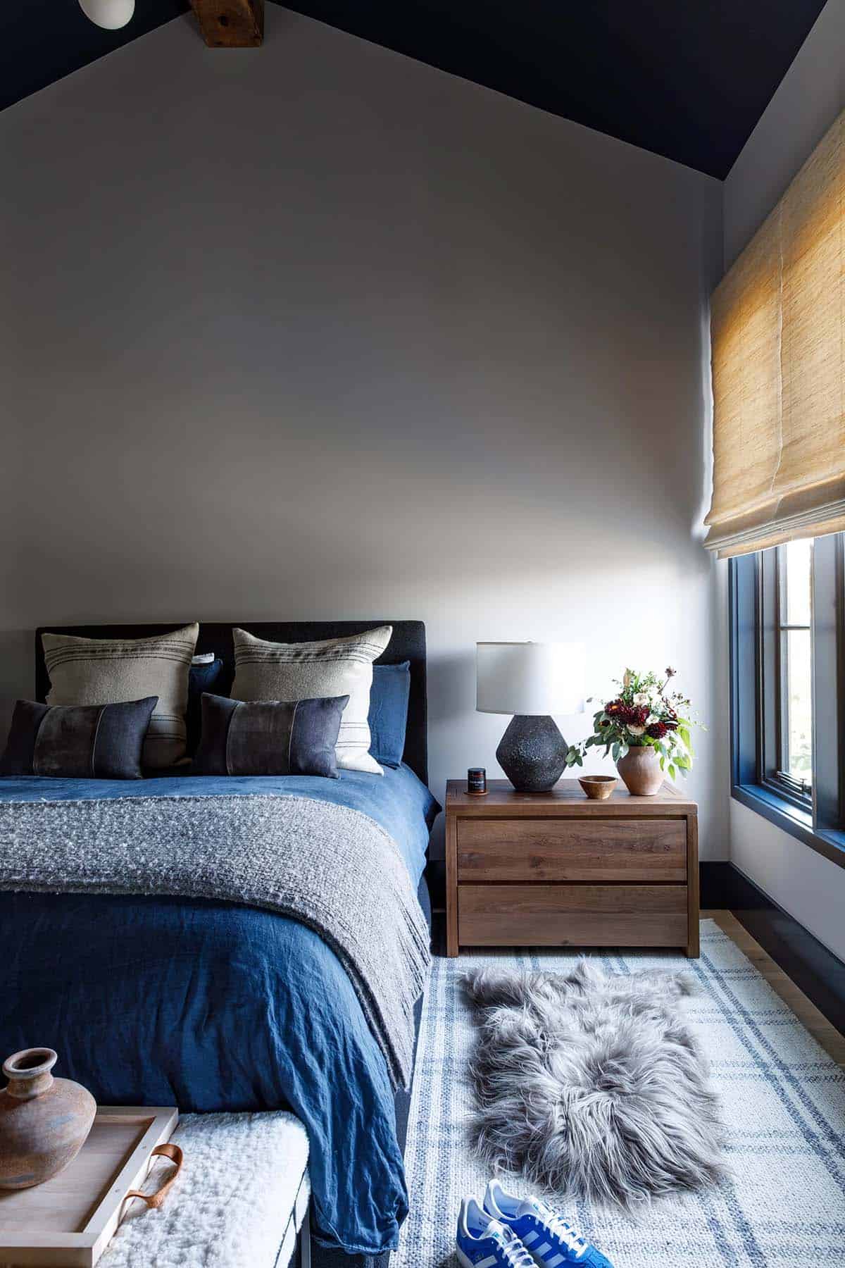 rustic modern bedroom with blue walls