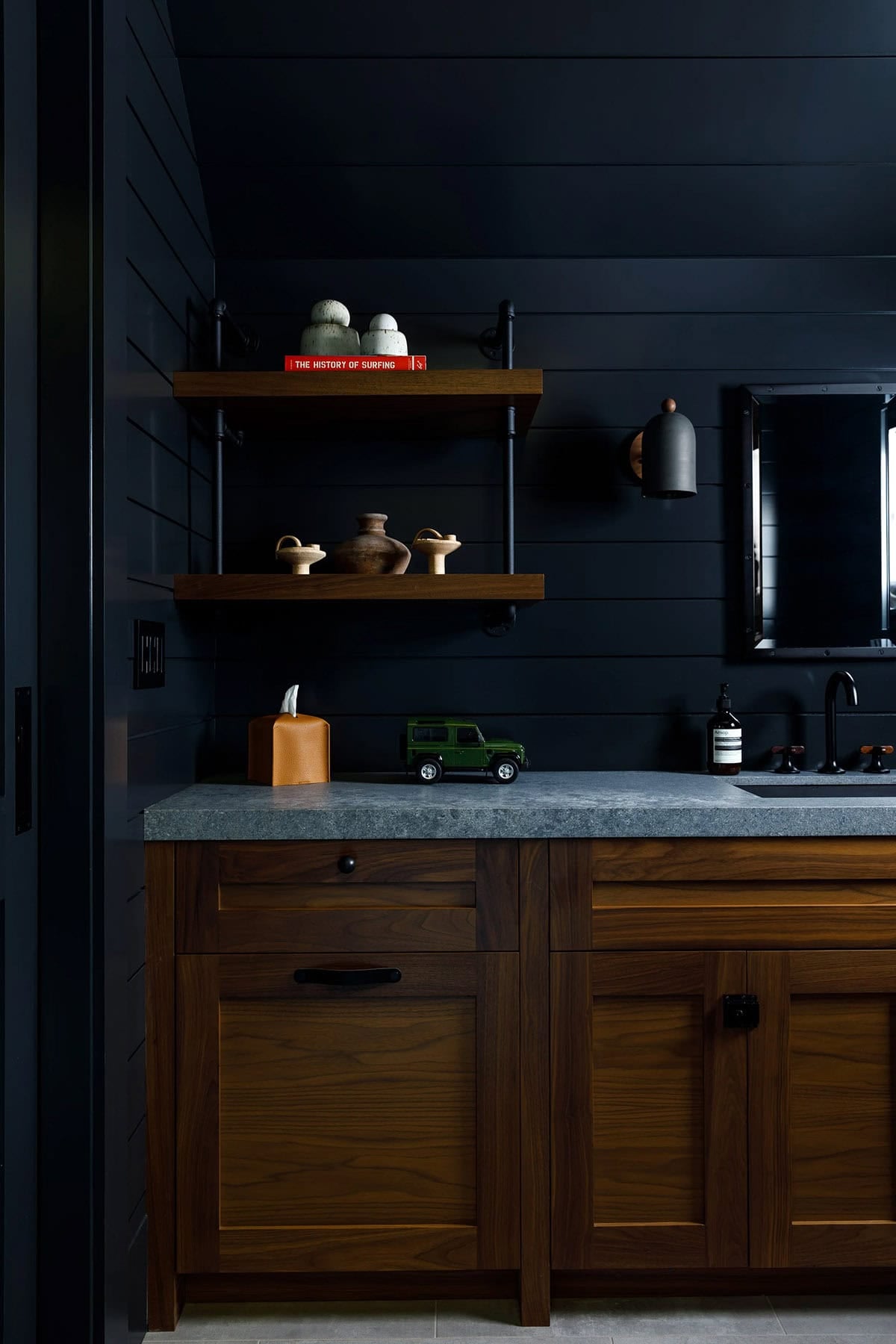 rustic modern bathroom vanity with blue walls