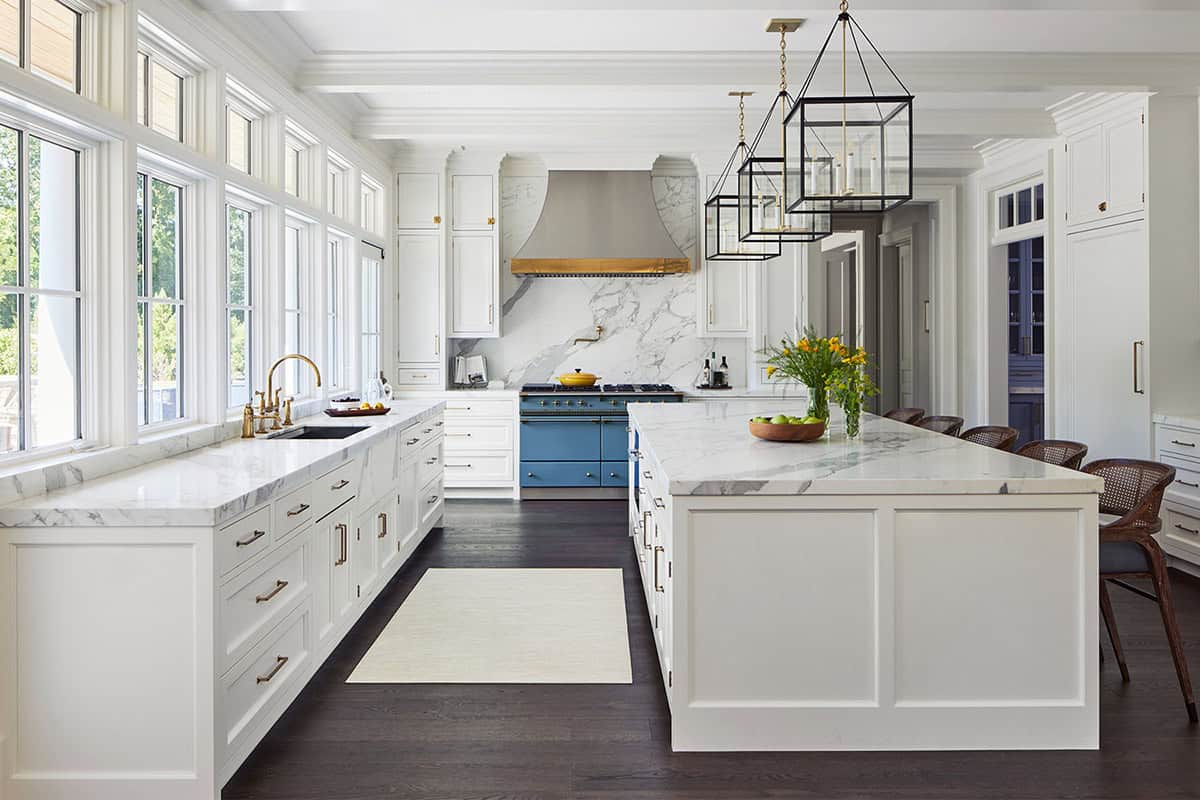 transitional style kitchen with large pendant lights