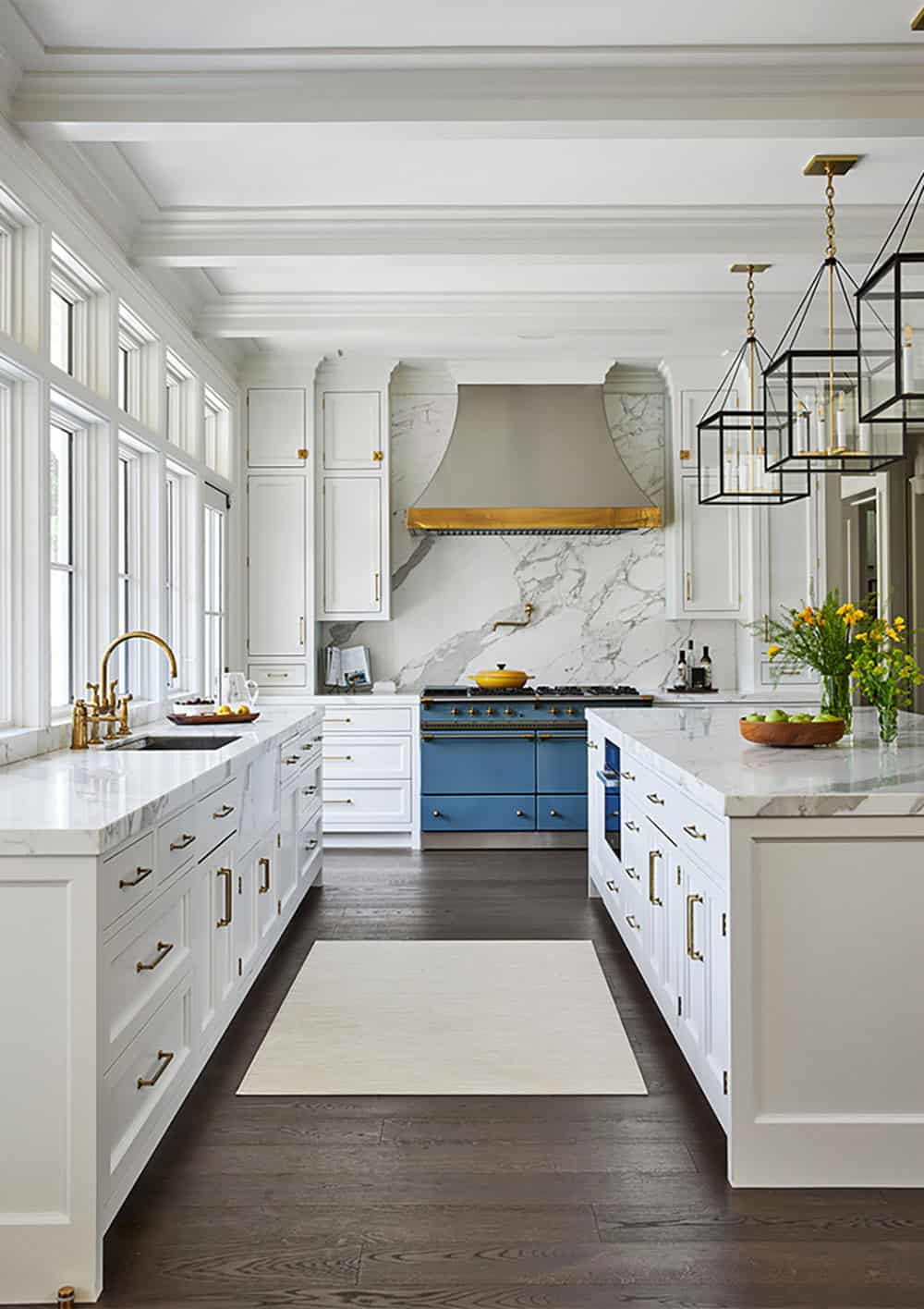 transitional style kitchen with large pendant lights