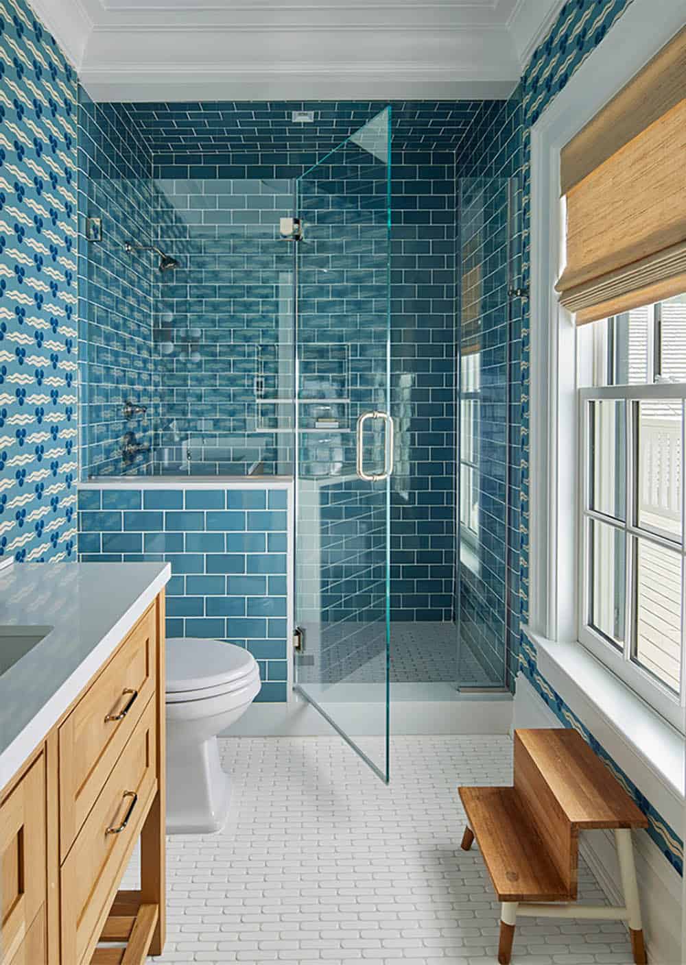 transitional style bathroom with blue tiles