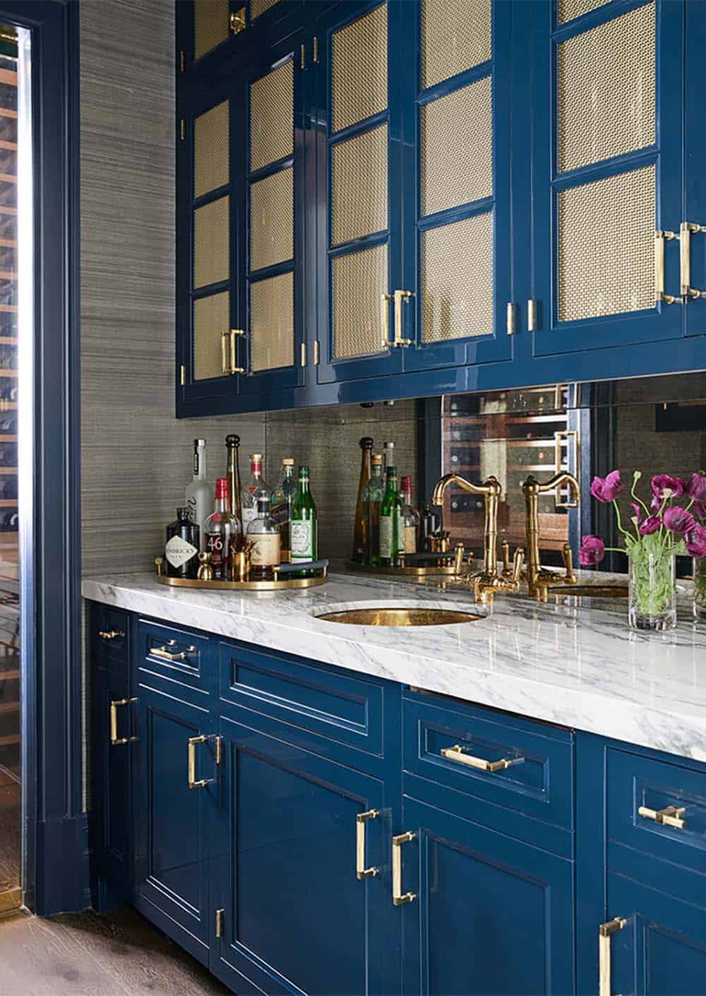 transitional style wet bar with a sink