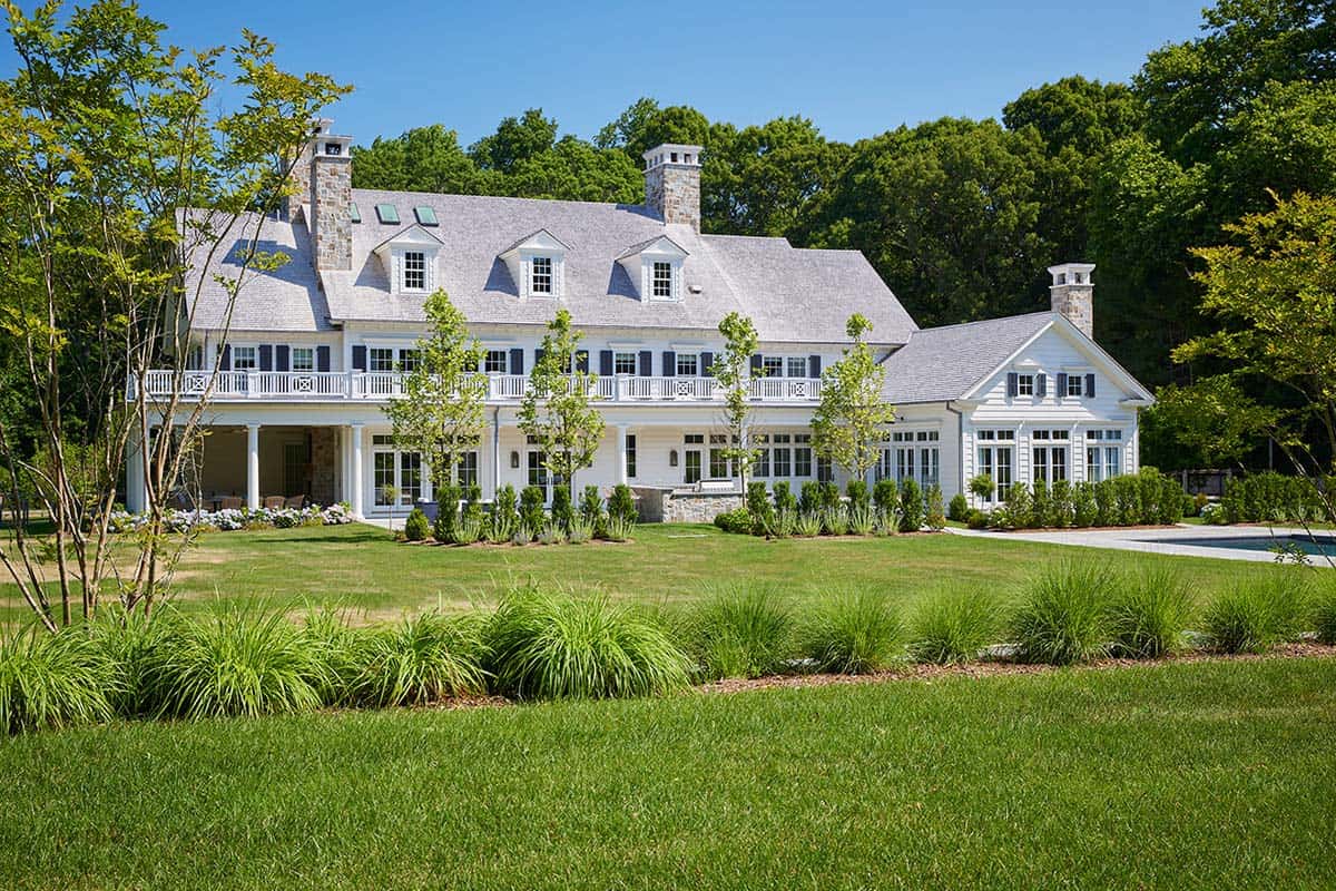 shingle-style colonial home exterior backyard view