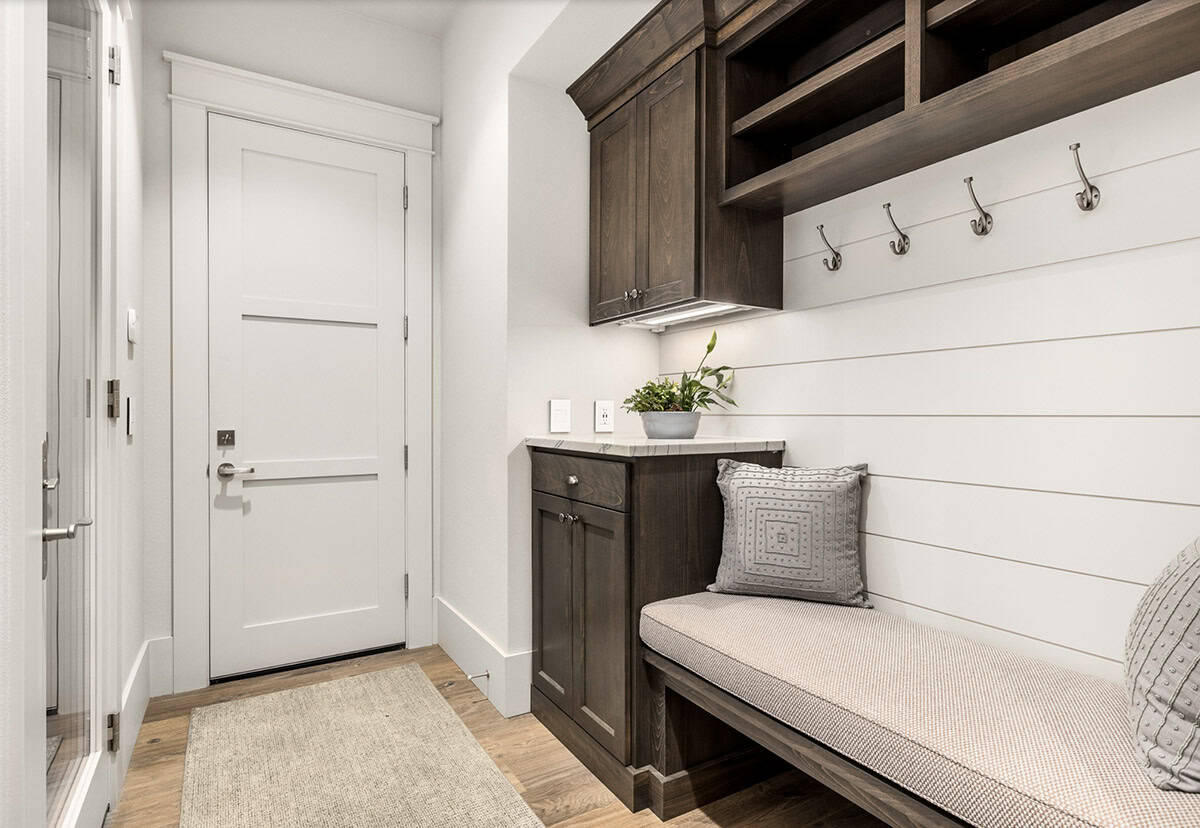 Transitional Mudroom with a built-in bench