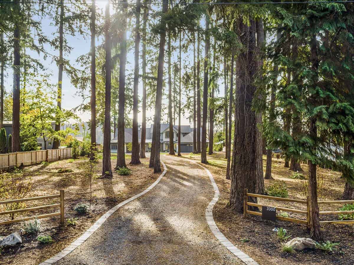 Transitional Lake House Exterior with a long driveway