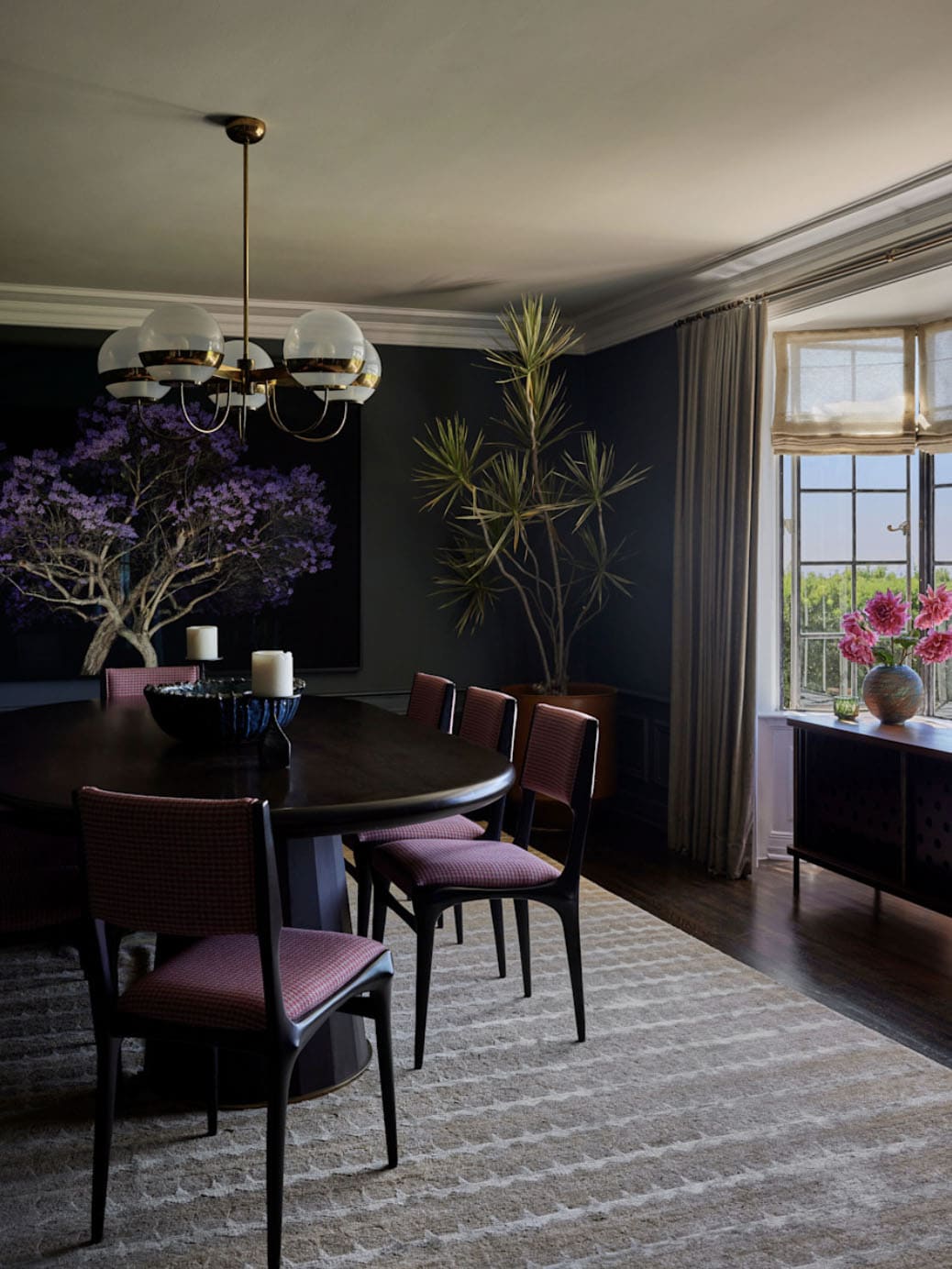 Dark dining room detail with globe chandelier and steel windows, Los Feliz colonial revival home