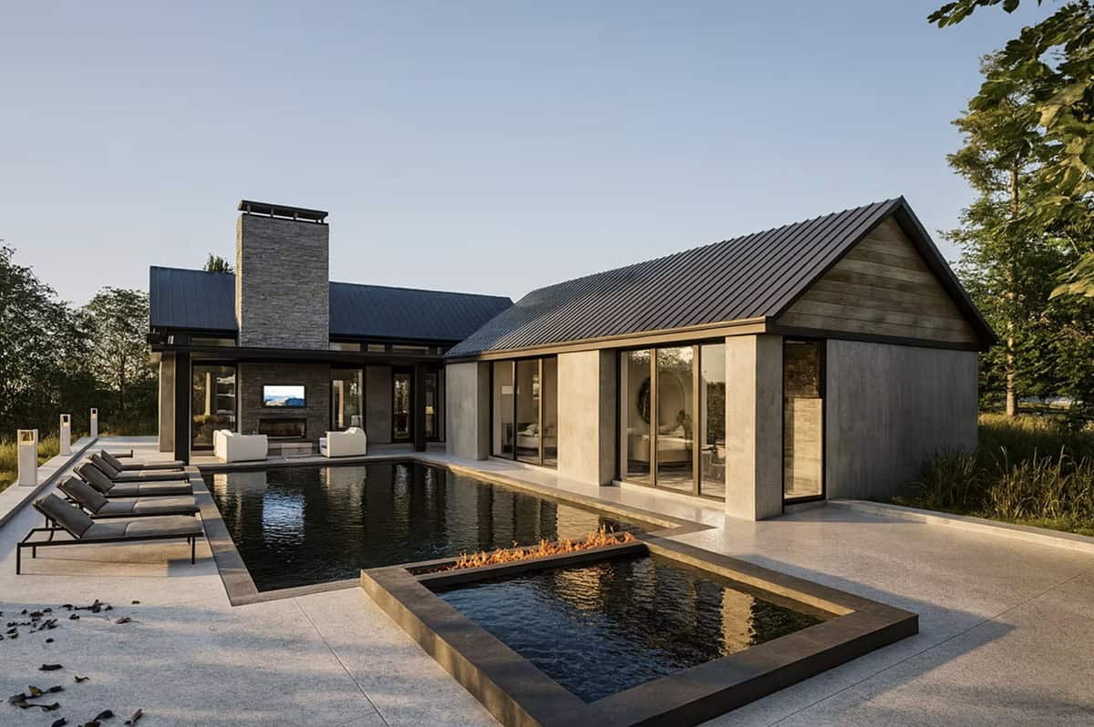 Contemporary home with infinity pool, fire feature, outdoor lounge, and panoramic St. Croix River views in Hudson Wisconsin