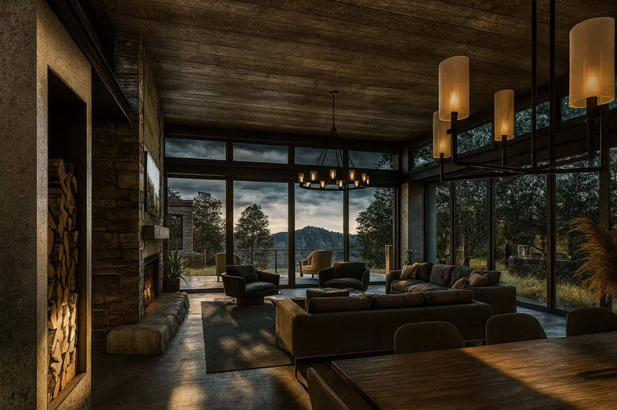 Contemporary living room at dusk with stone fireplace, floor-to-ceiling windows, and panoramic St. Croix River views in Hudson Wisconsin