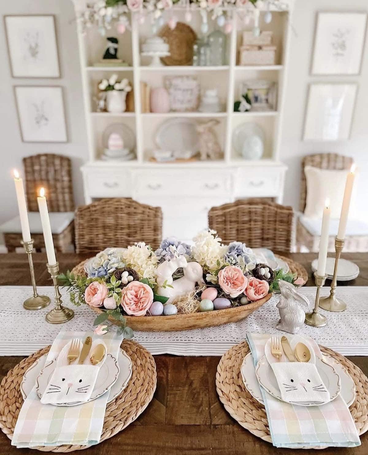 Easter tablescape with dough bowl centerpiece filled with pastel eggs, roses, and hydrangeas