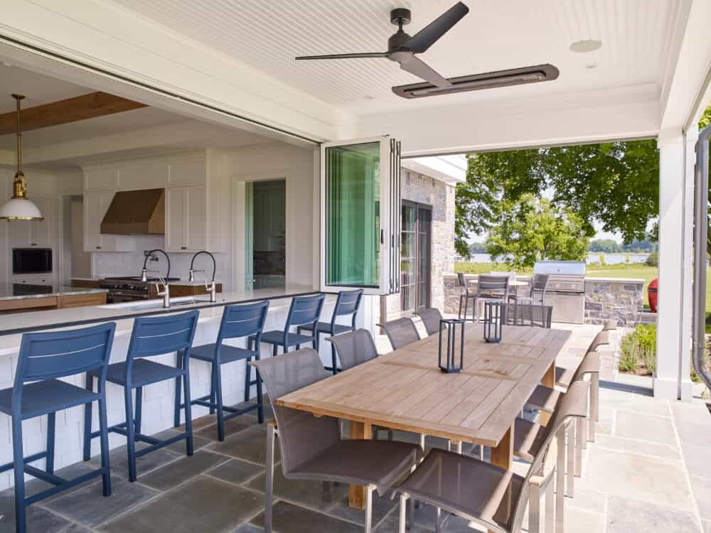 covered outdoor patio with pass through window bar and dining area