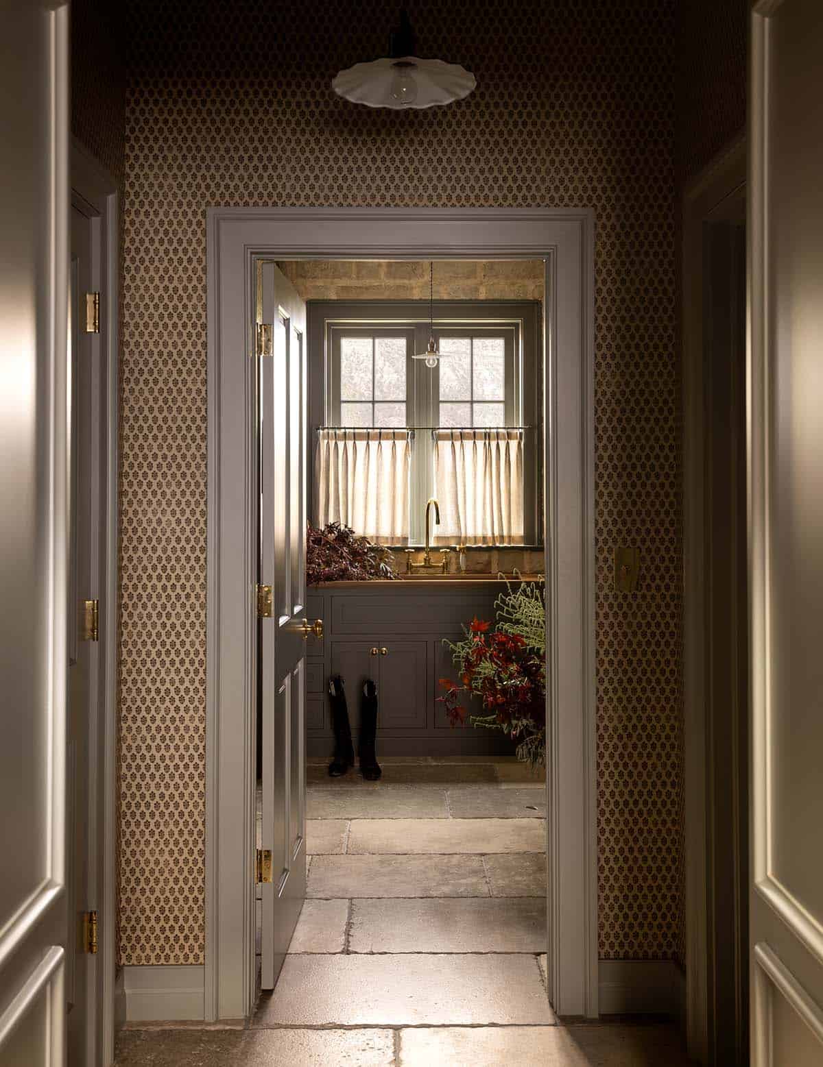 hallway leading to mudroom with Michael Smith wallpaper, Colorado equestrian home