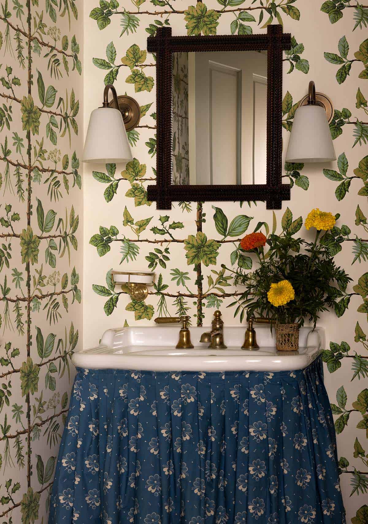 powder room with botanical wallpaper and skirted pedestal sink, Colorado equestrian home