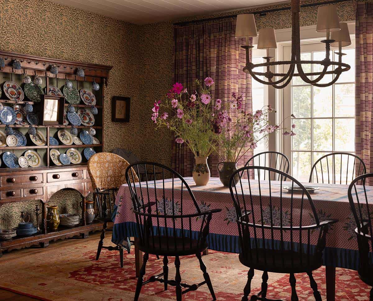formal dining room with Windsor chairs, antique Welsh dresser, and Morris wallpaper, Colorado equestrian home