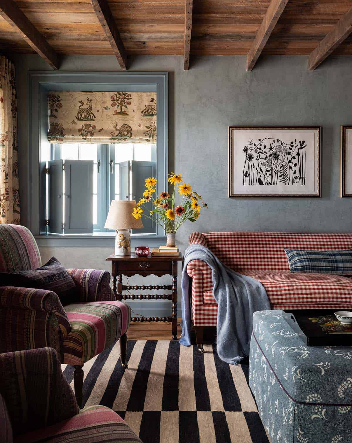 blue plastered family room with gingham sofa and animal print roman shade, Colorado equestrian home