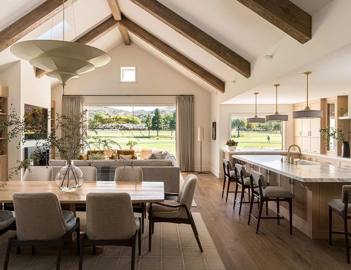 Open plan kitchen dining and living room with golf course views