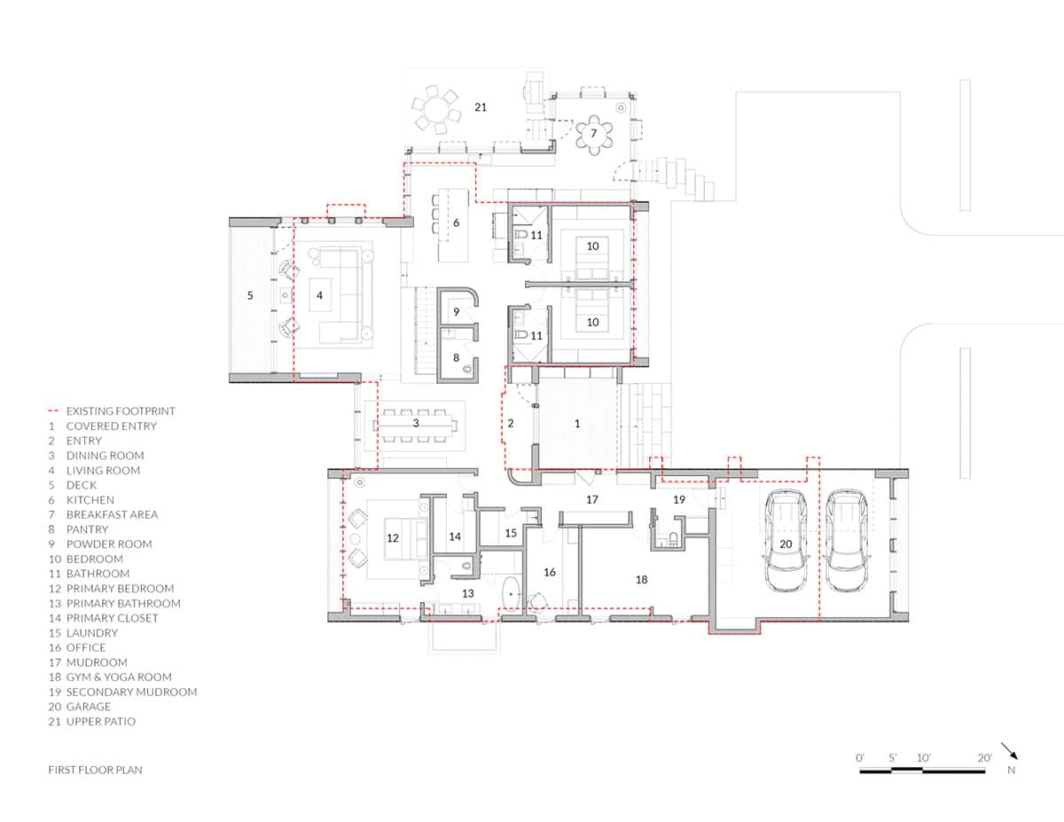 Architectural first floor plan showing layout of covered entry, dining, living, kitchen, bedrooms, mudroom, and garage