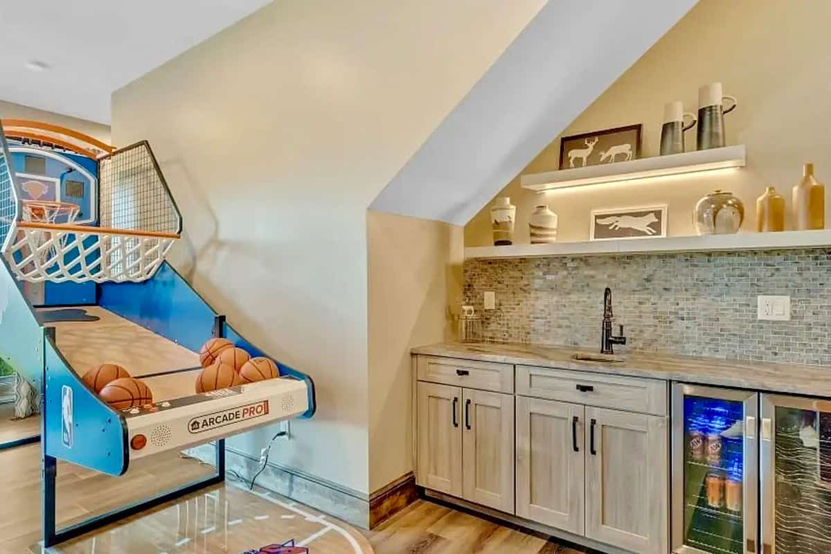 wet bar with a mini basketball toss game