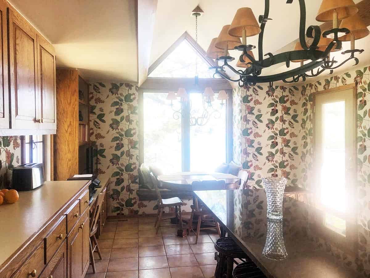 Mountain lodge home kitchen and breakfast nook before the remodel
