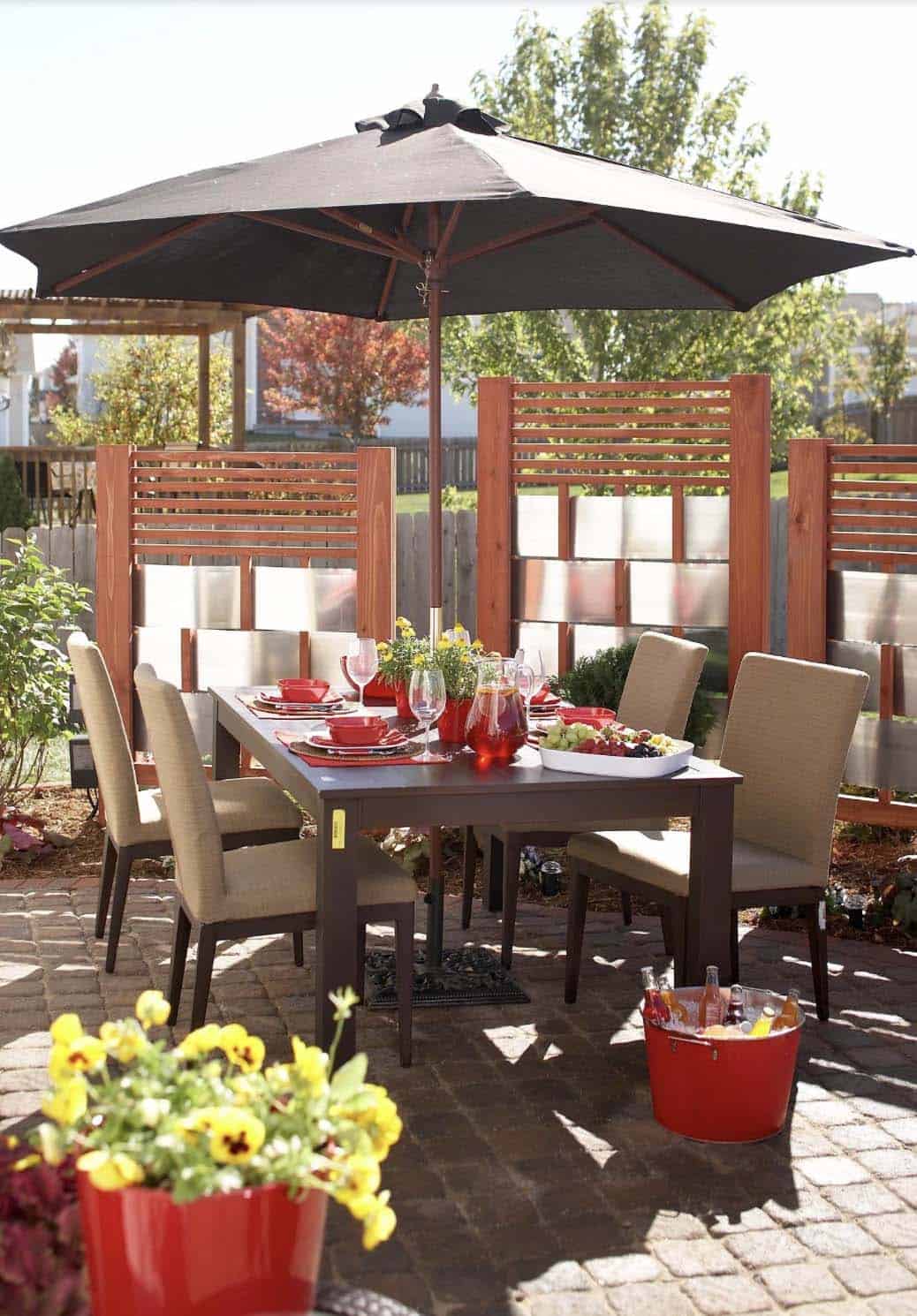 traditional style backyard patio hideaway with an aluminum privacy screen