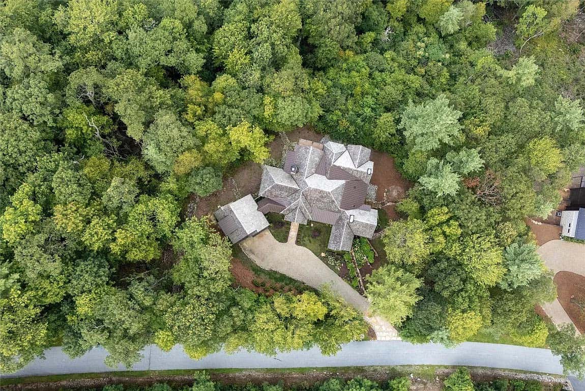 mountain home exterior aerial view surrounded by a dense forest in the Blue Ridge Mountains