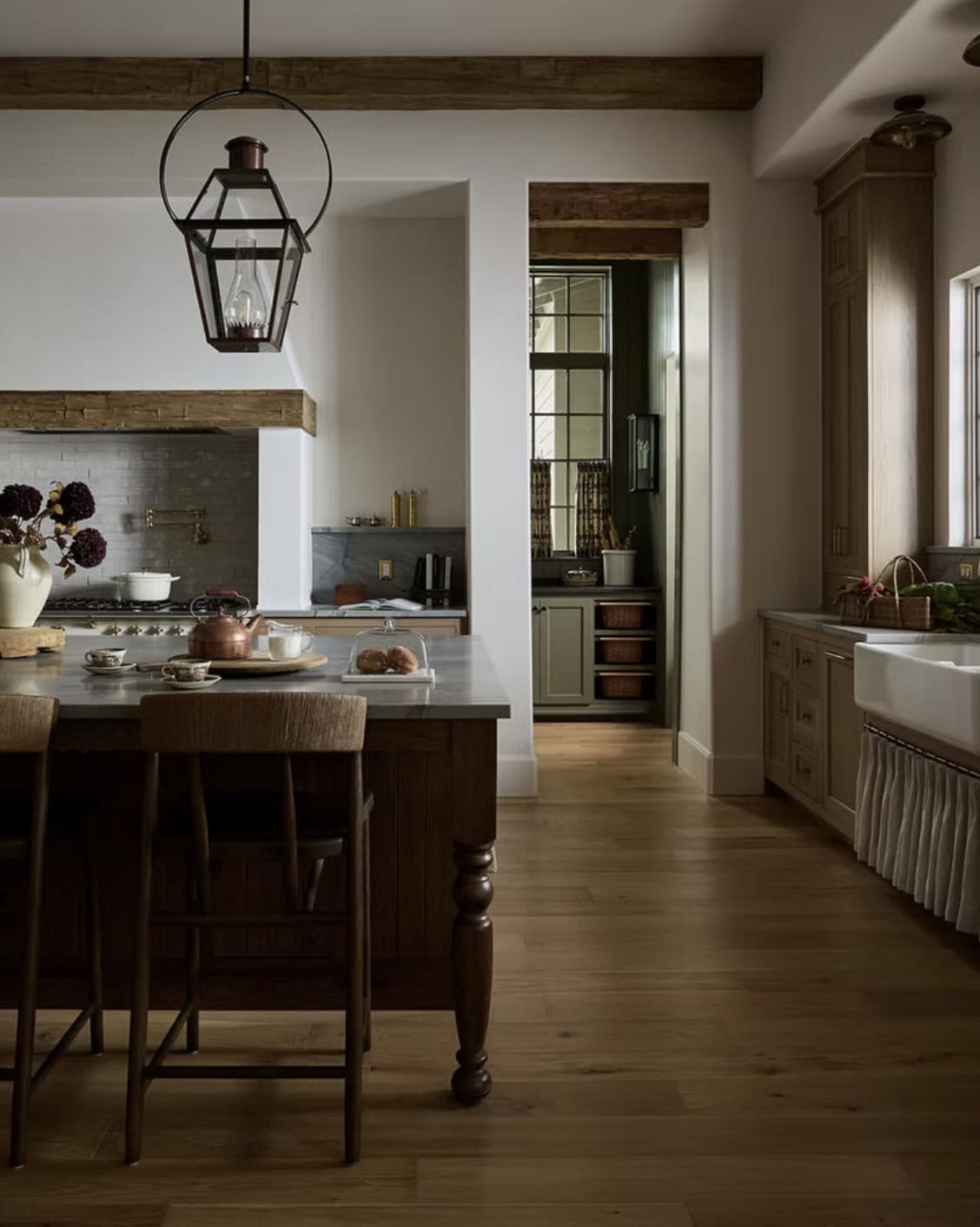 Kitchen Overview with Lantern Pendant and Pantry Glimpse