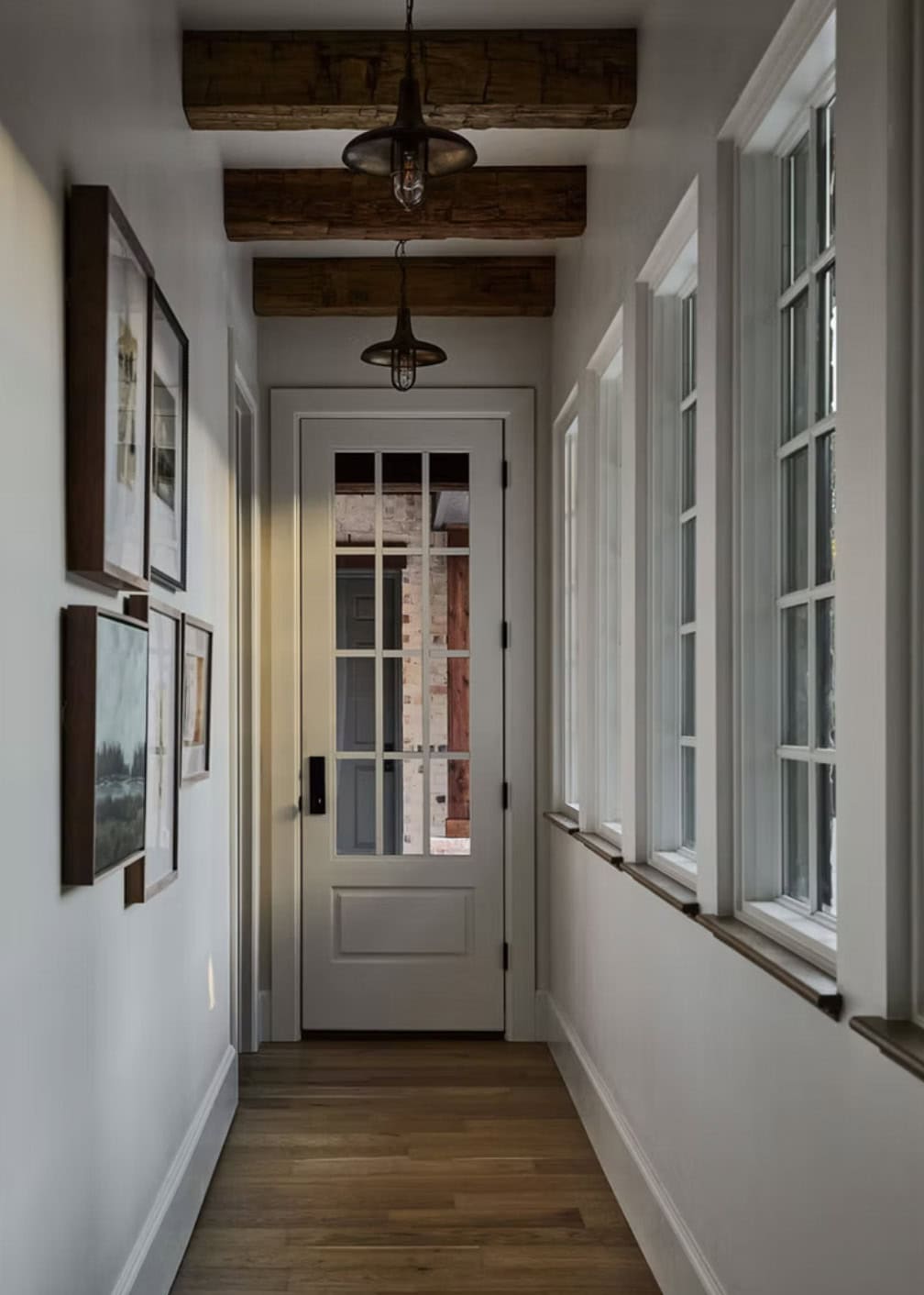 Hallway with Reclaimed Beam Ceiling and Industrial Pendants